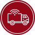 a red circle with a white truck and a wifi icon